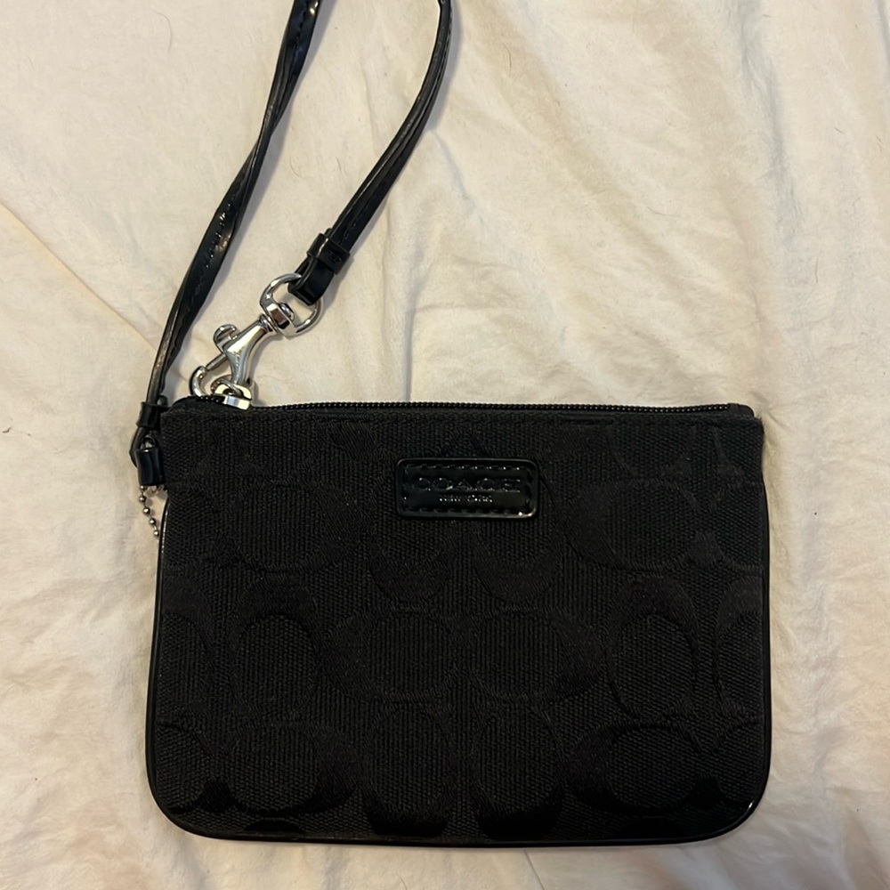 Black coach wristlet.